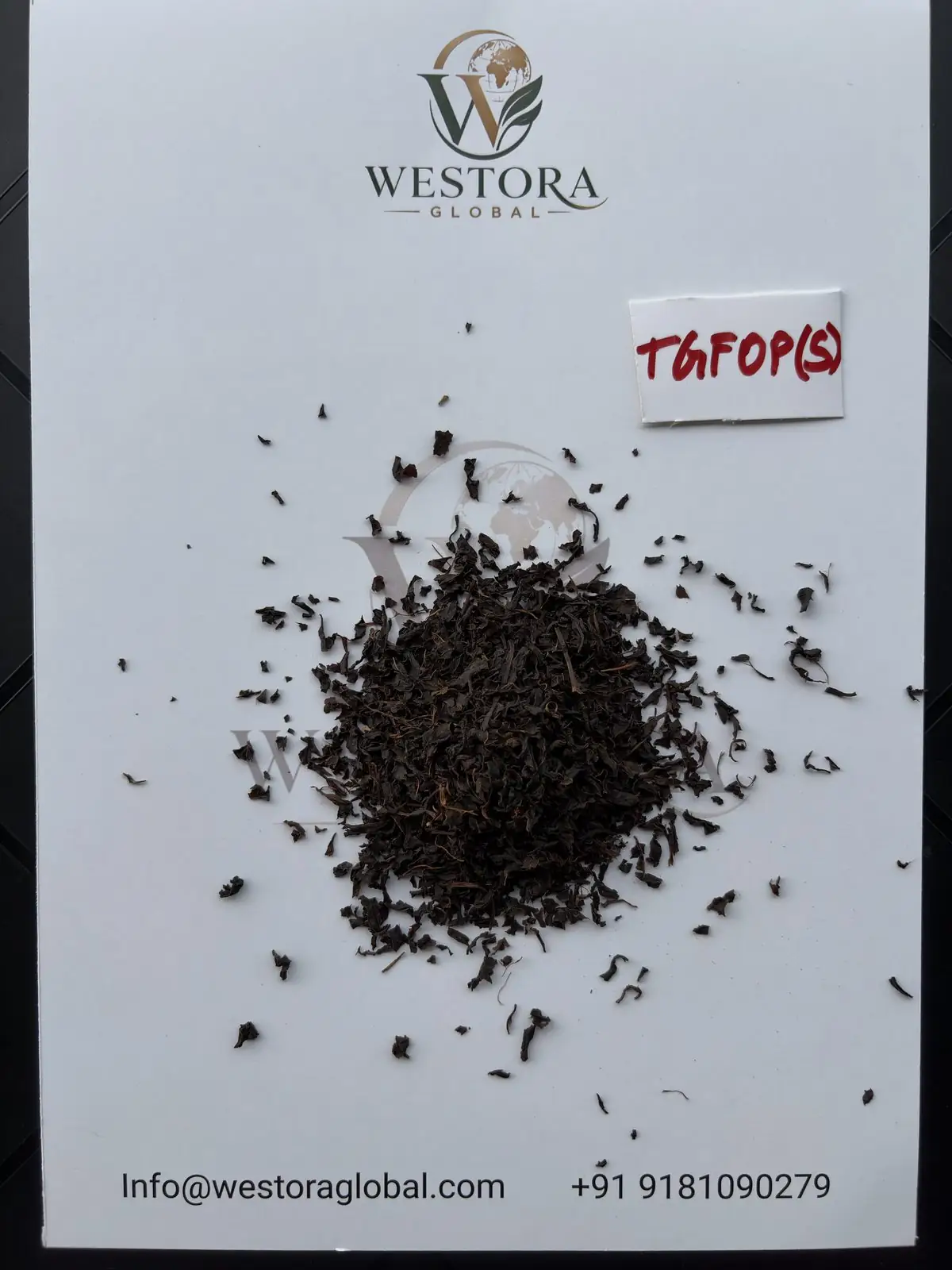 阿萨姆传统工艺红茶 — TGFOP(S) 等级 — Dry Assam orthodox black tea, TGFOP(S) grade, on a Westora Global sample sheet